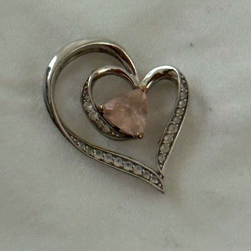 1 in. Sterling silver heart shaped pendant.